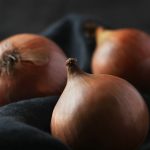 Food ingredient. Onion on the table